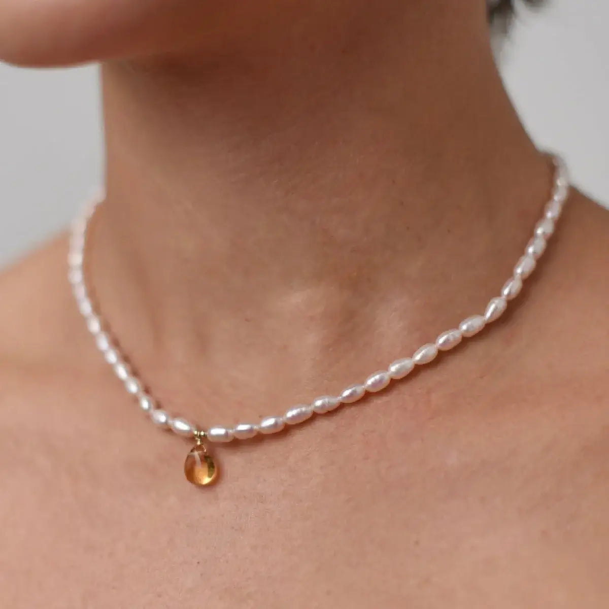 Choker with rice pearls and citrine pendant, gold-filled metal