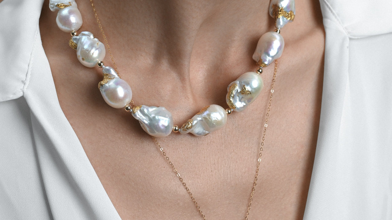 Gold leaf necklace with big natural white pearls