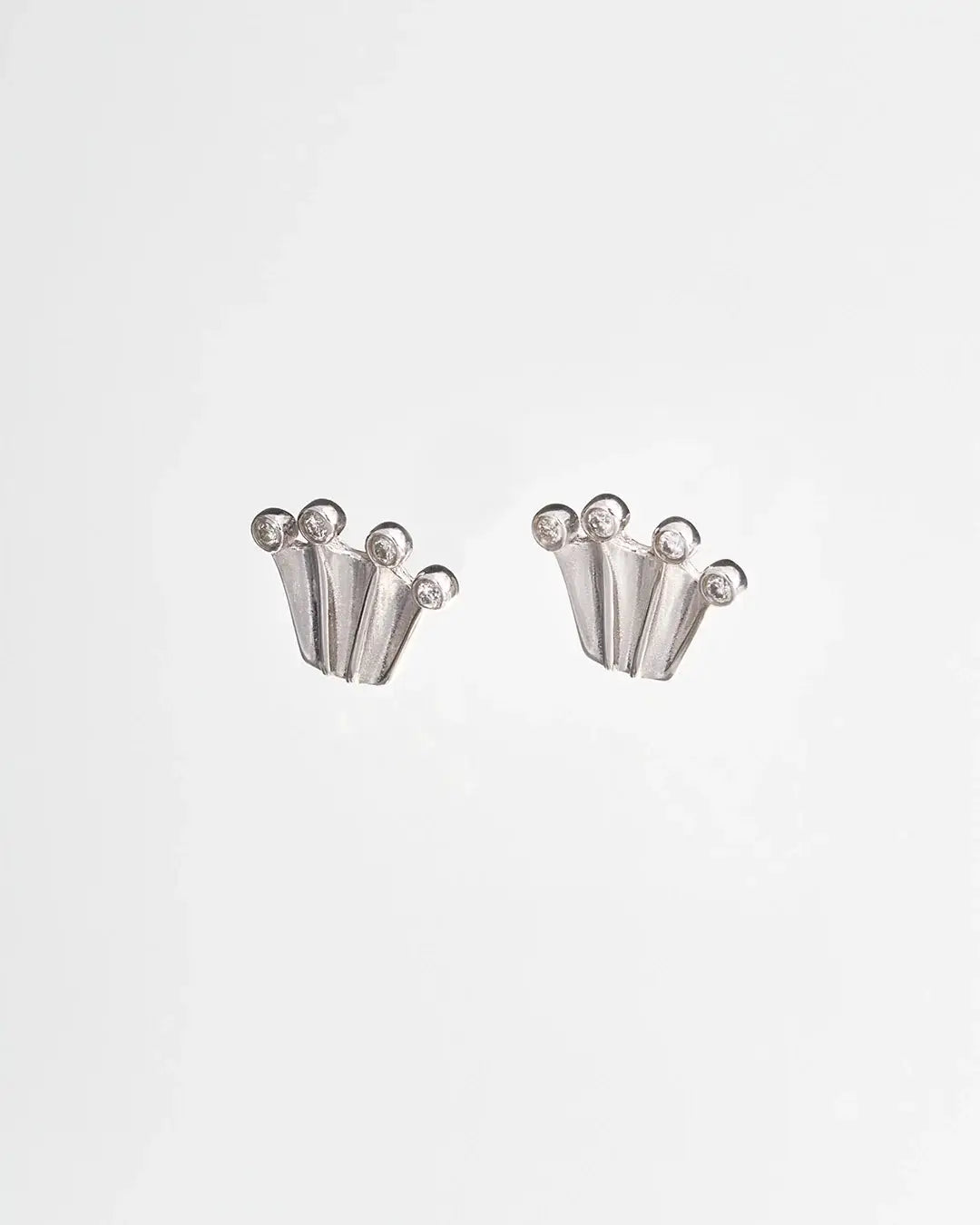 Silver stud earrings in crown form with lab-grown diamonds