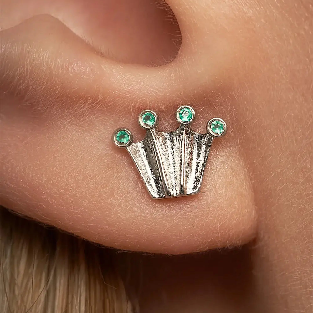 Silver stud earrings in crown form with green onyx gemstones
