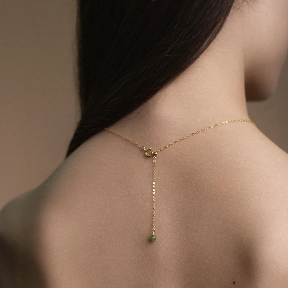 
                  
                    Gold-filled Chain necklace with jade gemstone pendant
                  
                