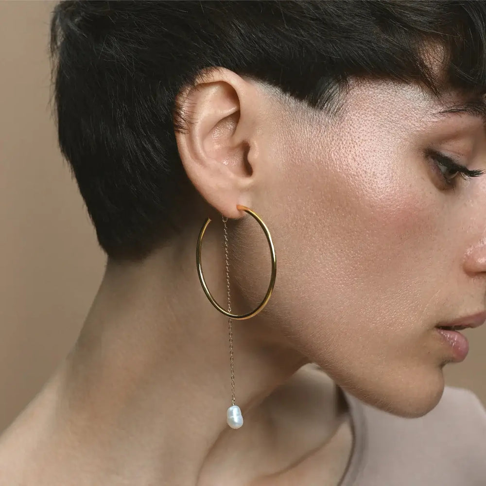 
                  
                    Gold Hoop Earrings with gold chain and white pearl
                  
                