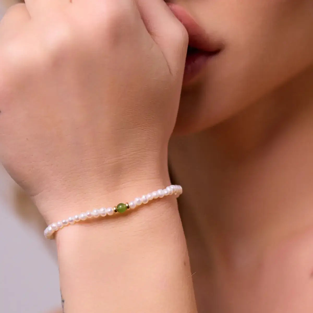 Jade Whispers pearl bracelet with jade, gold-filled metal