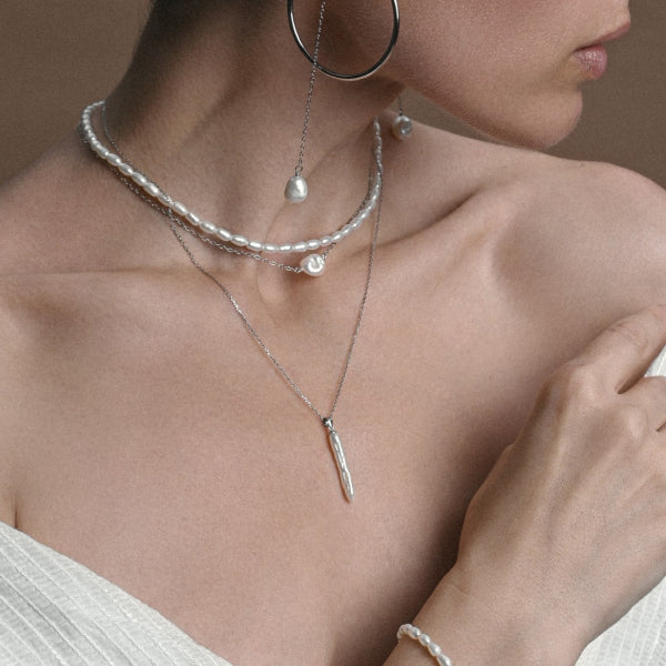 Layered pearl and chain necklaces by Pearl Code