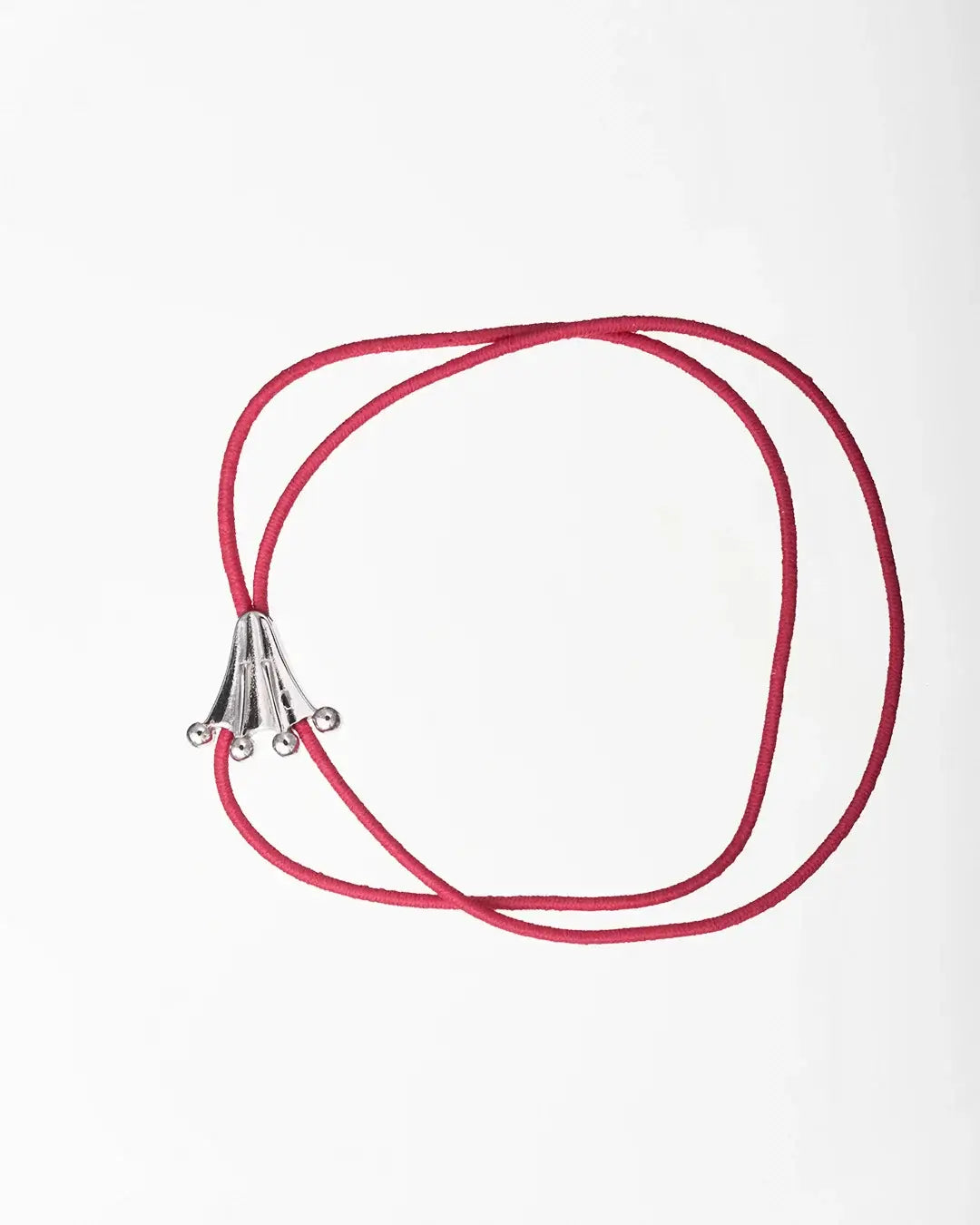 Frog's paw logo on fuchsia elastic bracelet