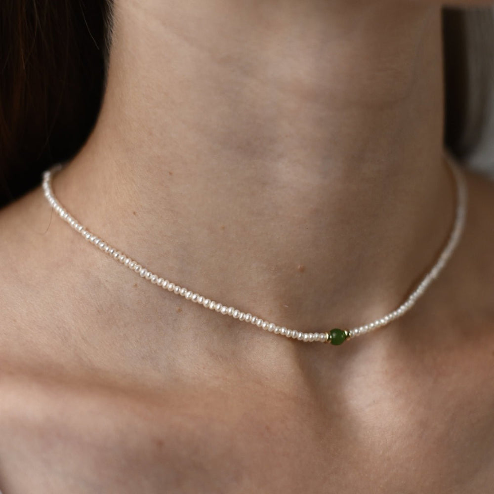 
                  
                    Choker with 3mm round white pearl and jade natural stone
                  
                