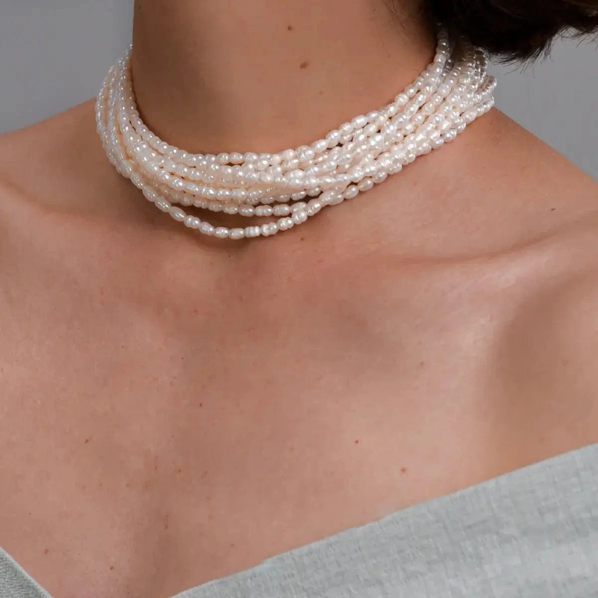 Necklace 12 rows white pearl 3 mm baroque rice Premium photo