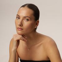 Luna White Gold Pearl Stud Earrings photo