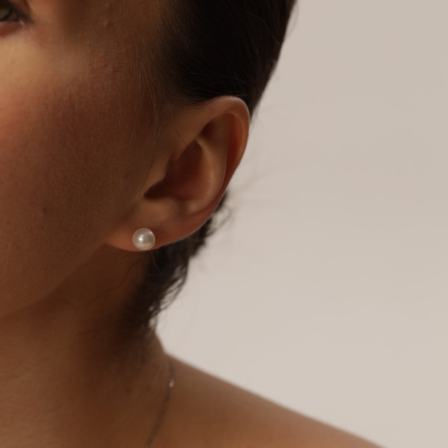 Luna White Gold Pearl Stud Earrings photo