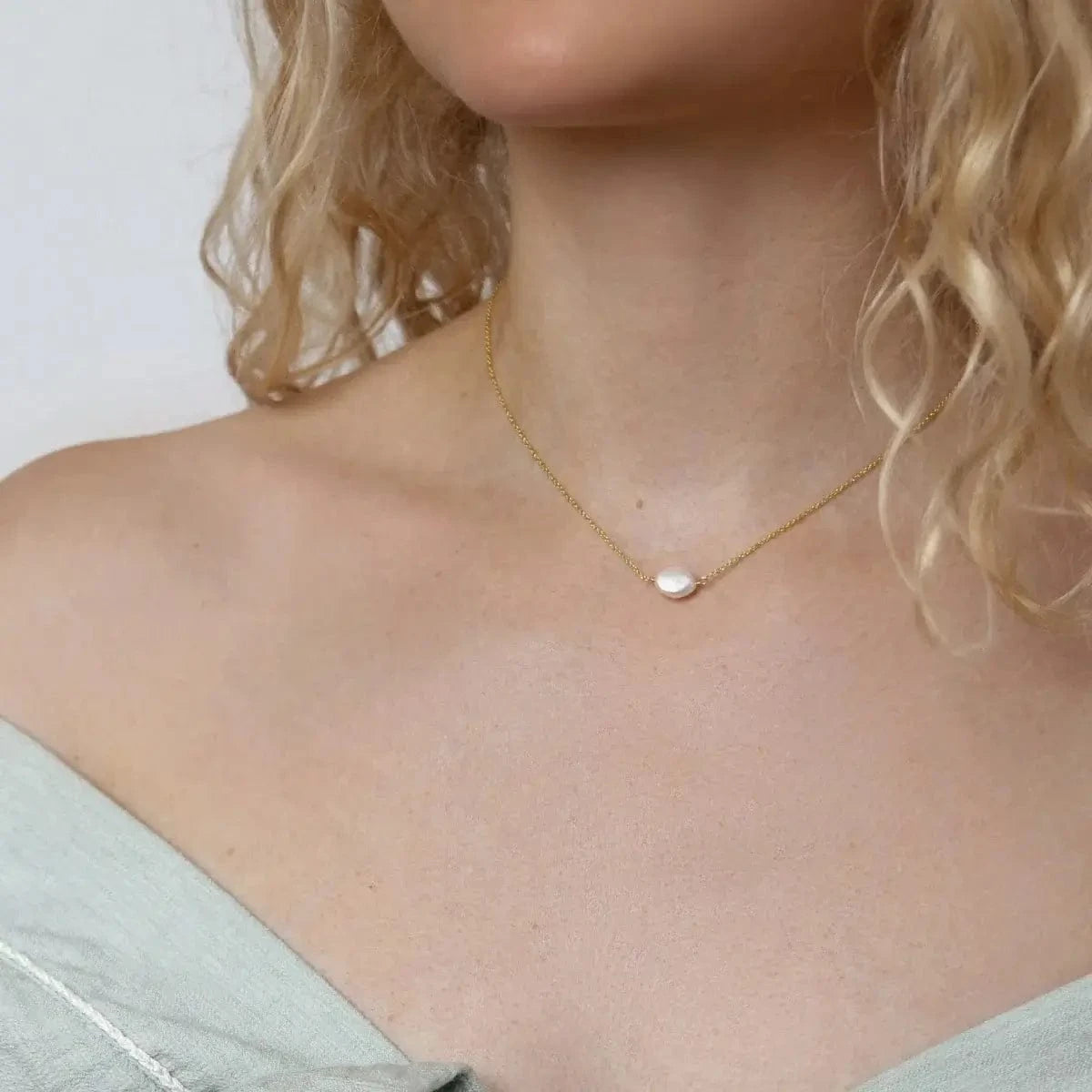 Gold-filled chain choker and baroque pearl photo