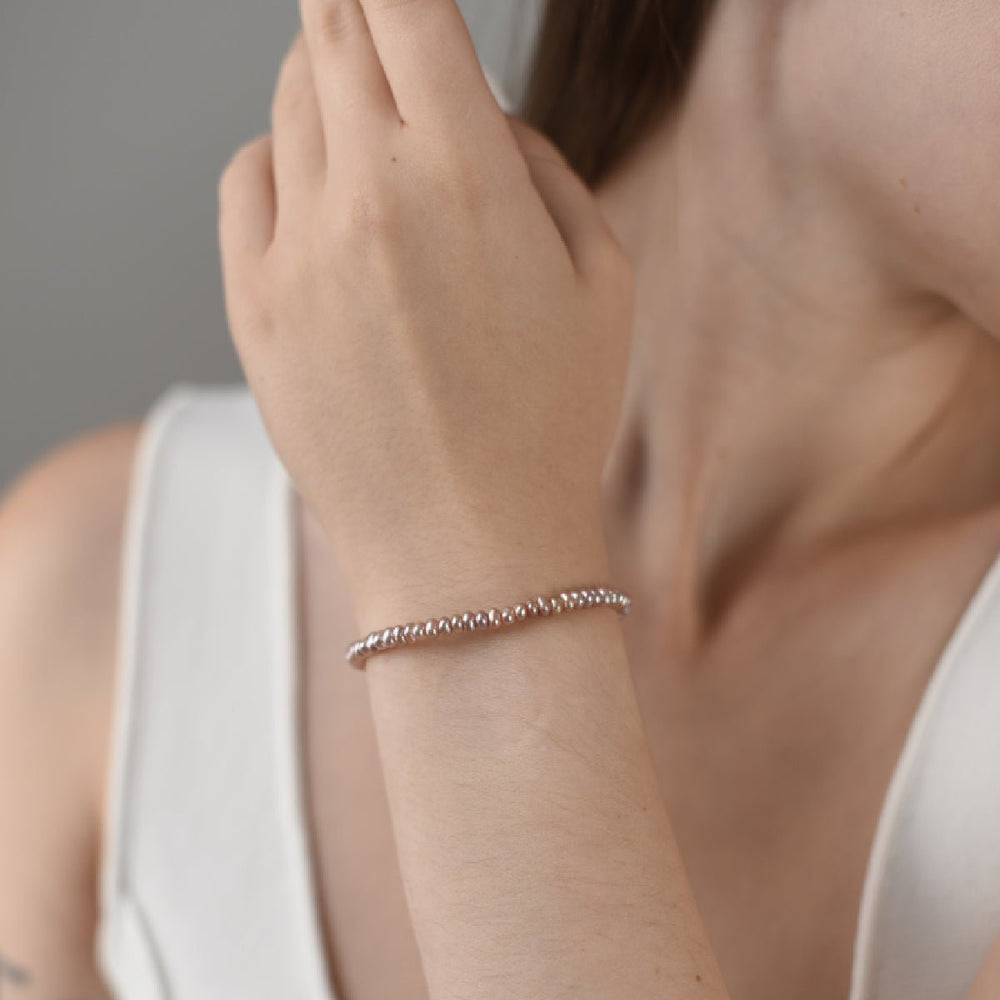 
                  
                    Bracelet with 4mm natural round pink pearls, silver metal
                  
                