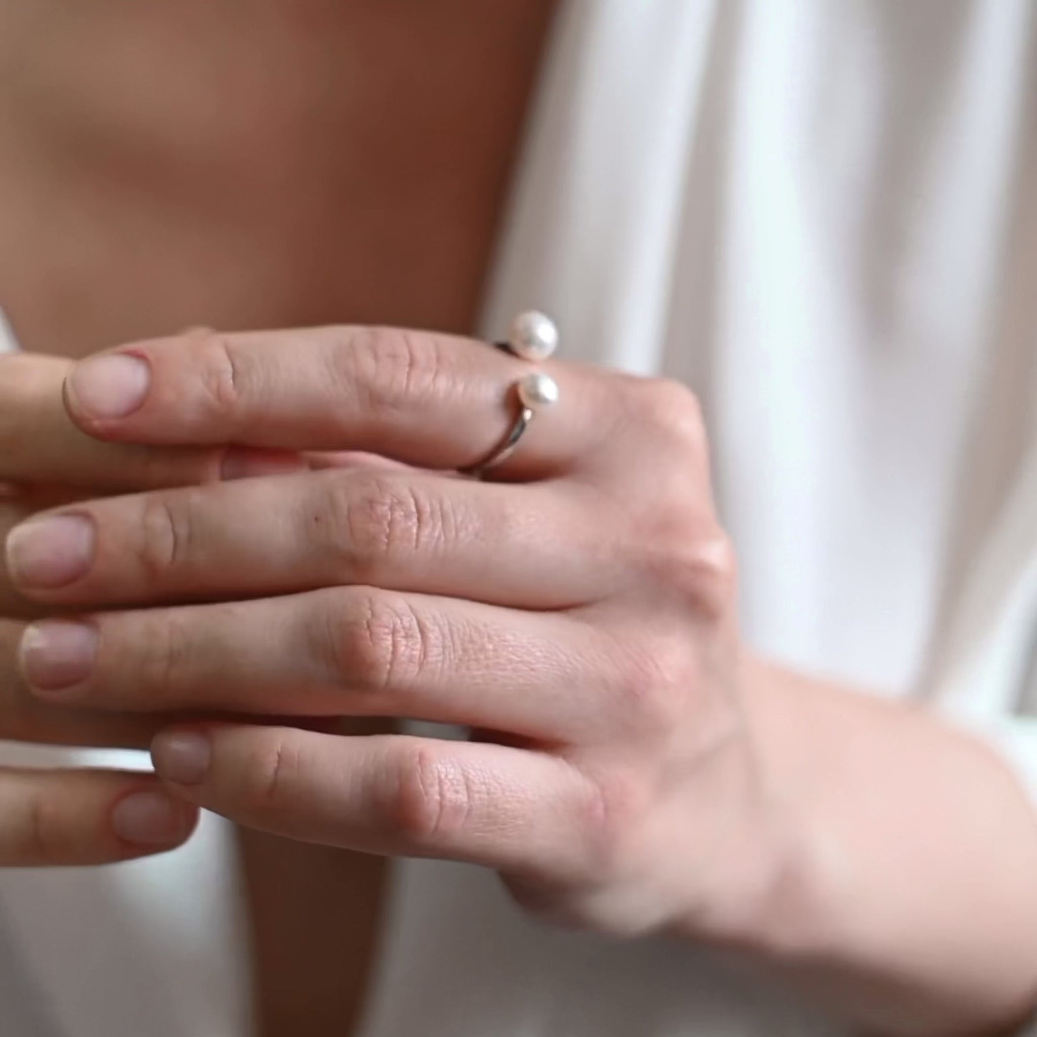 Silver ring with two white pearls 