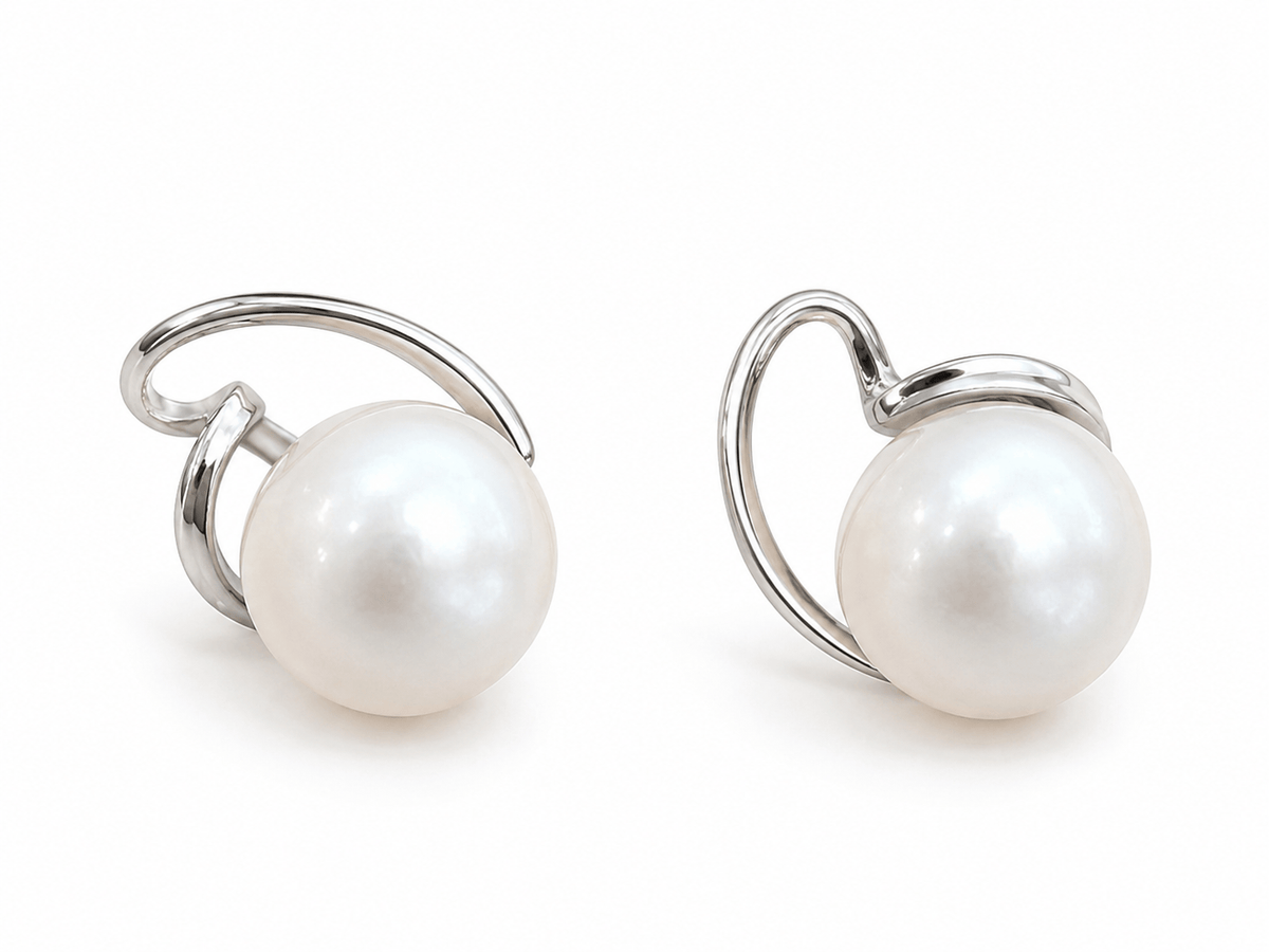 Vela White Pearl Silver Stud Earrings photo